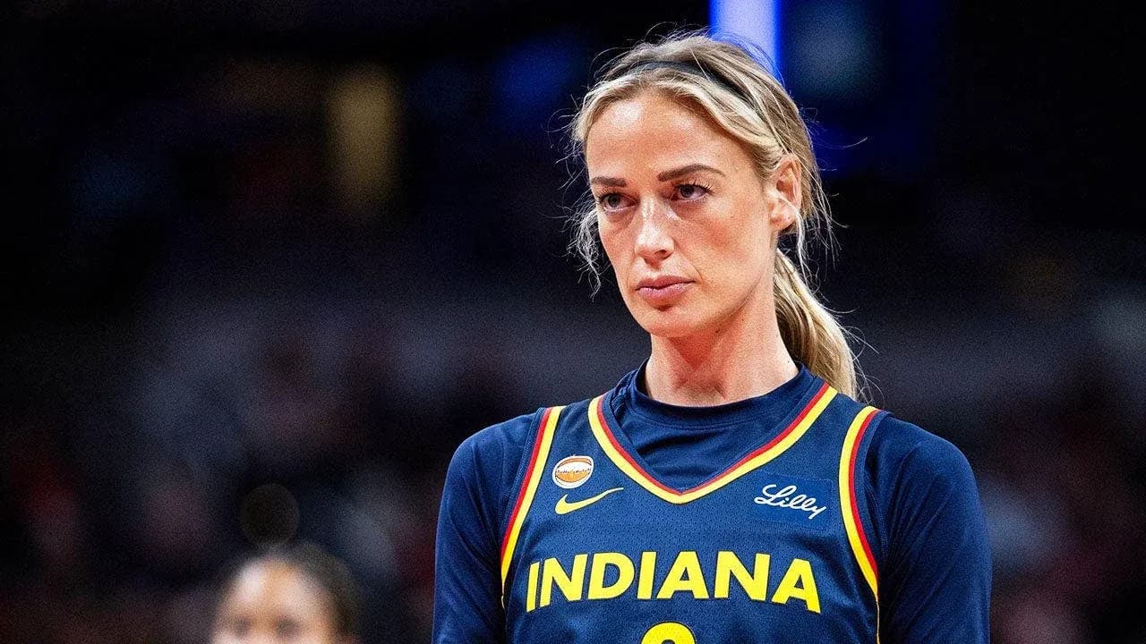 Basketball player in Indiana jersey during game Basketball player in Indiana jersey during game