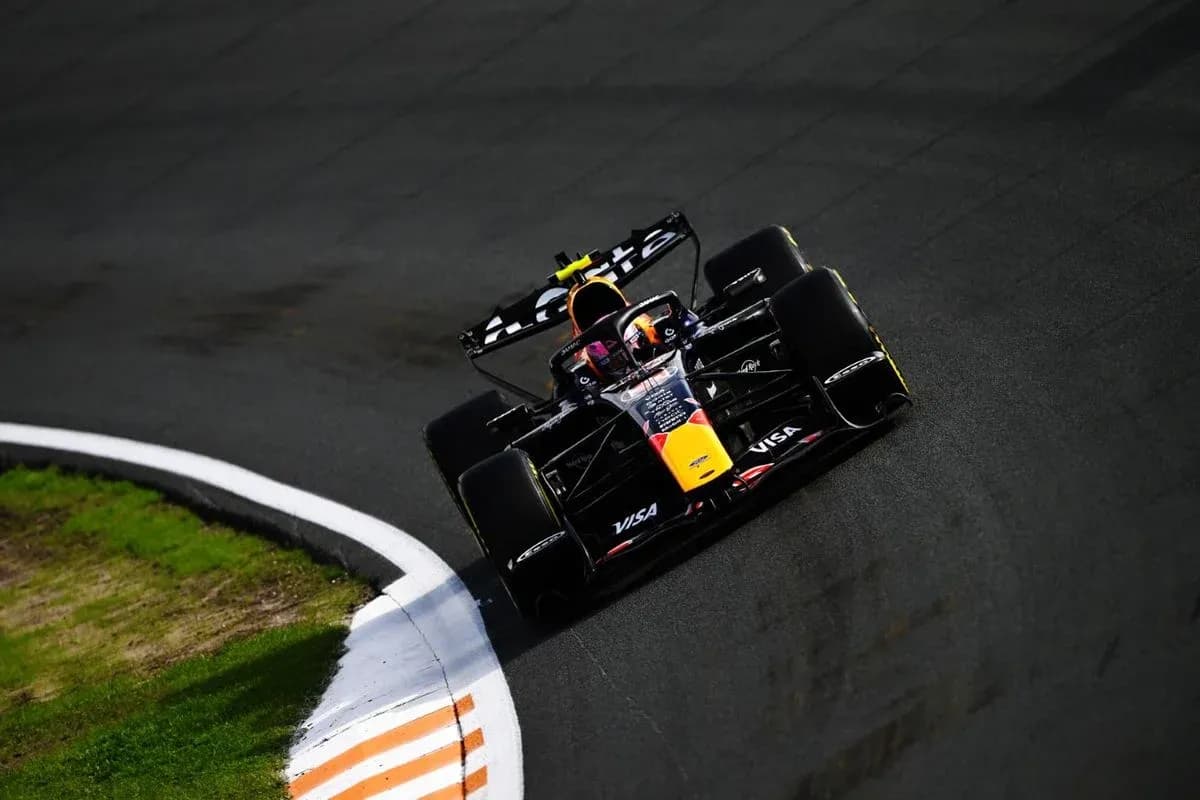 Formula 1 car navigating a racetrack corner Formula 1 car navigating a racetrack corner