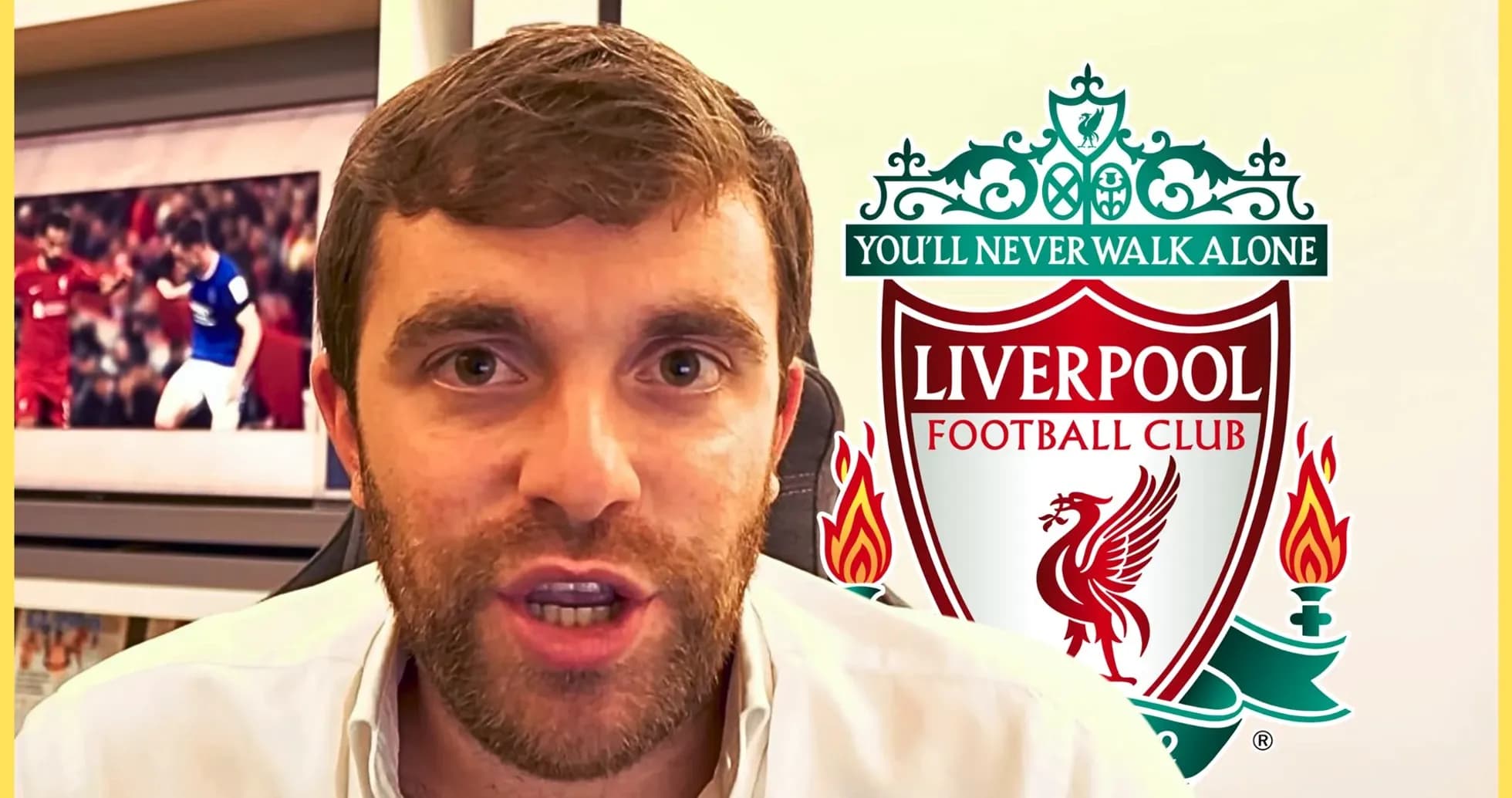 Sport journalist speaking with Liverpool logo behind Sport journalist speaking with Liverpool logo behind