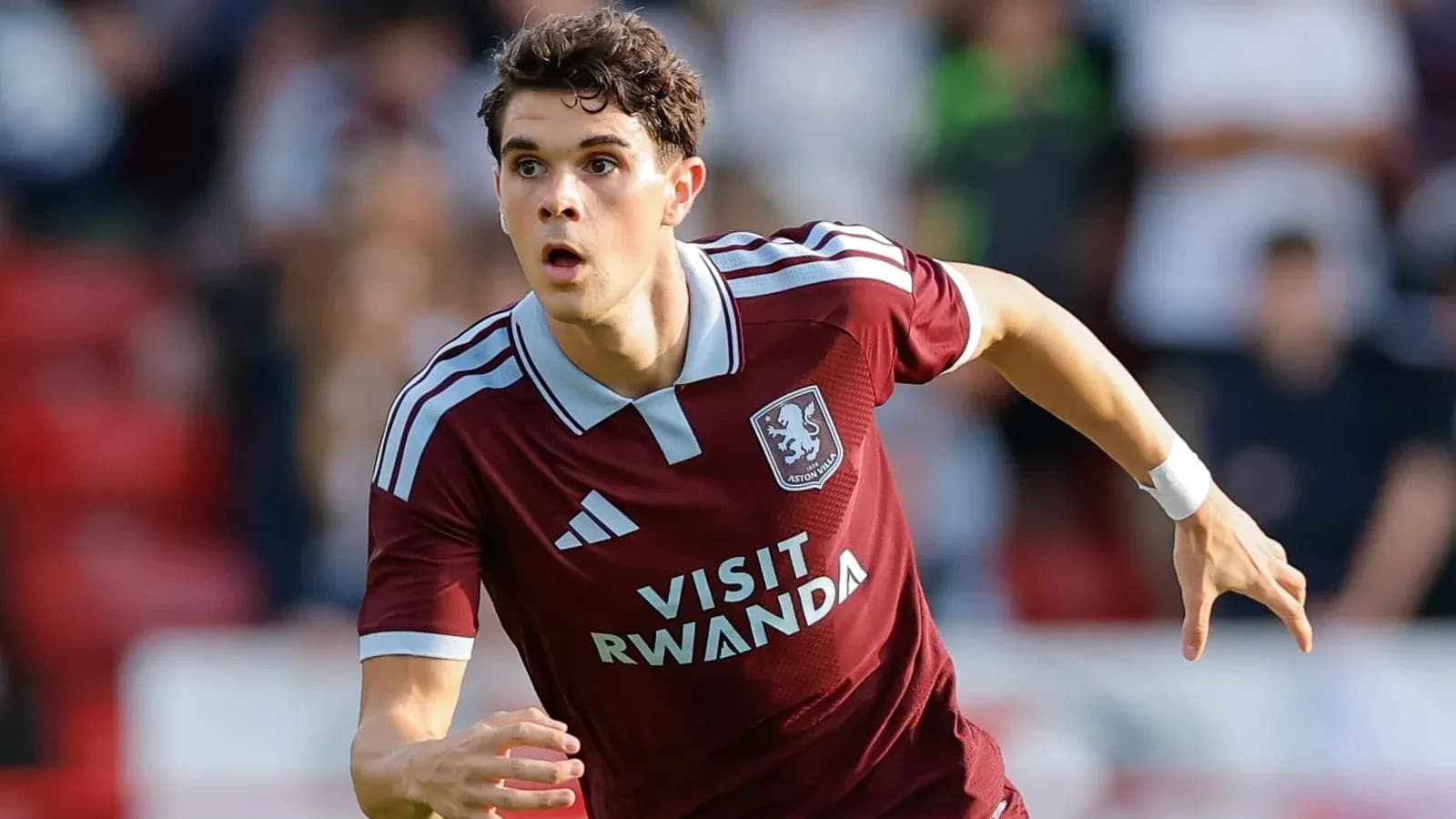 Aston Villa player running during a match Aston Villa player running during a match