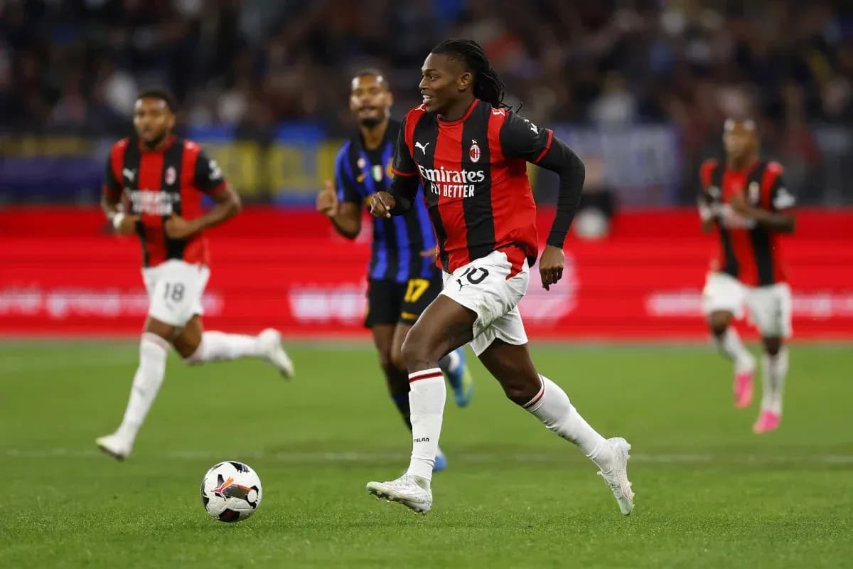 Milan player dribbling the ball during match Milan player dribbling the ball during match