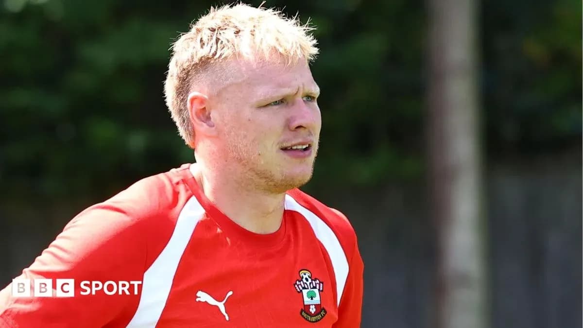 Football player training in Southampton FC kit Football player training in Southampton FC kit