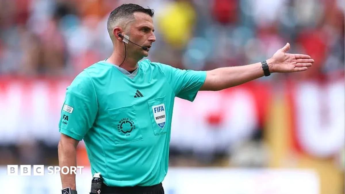 Referee giving instructions during a football match Referee giving instructions during a football match