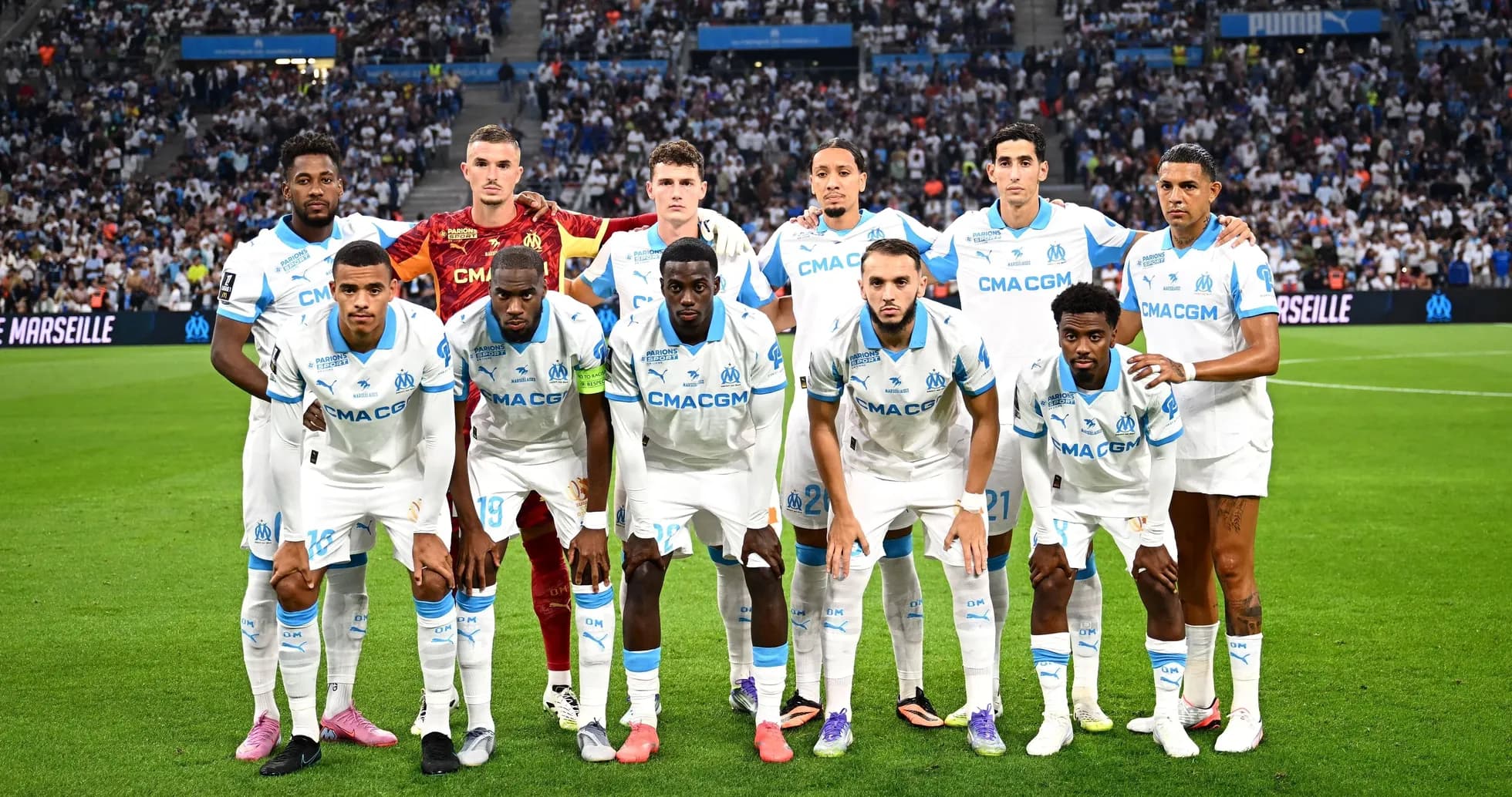Olympique de Marseille team posing for photo Olympique de Marseille team posing for photo