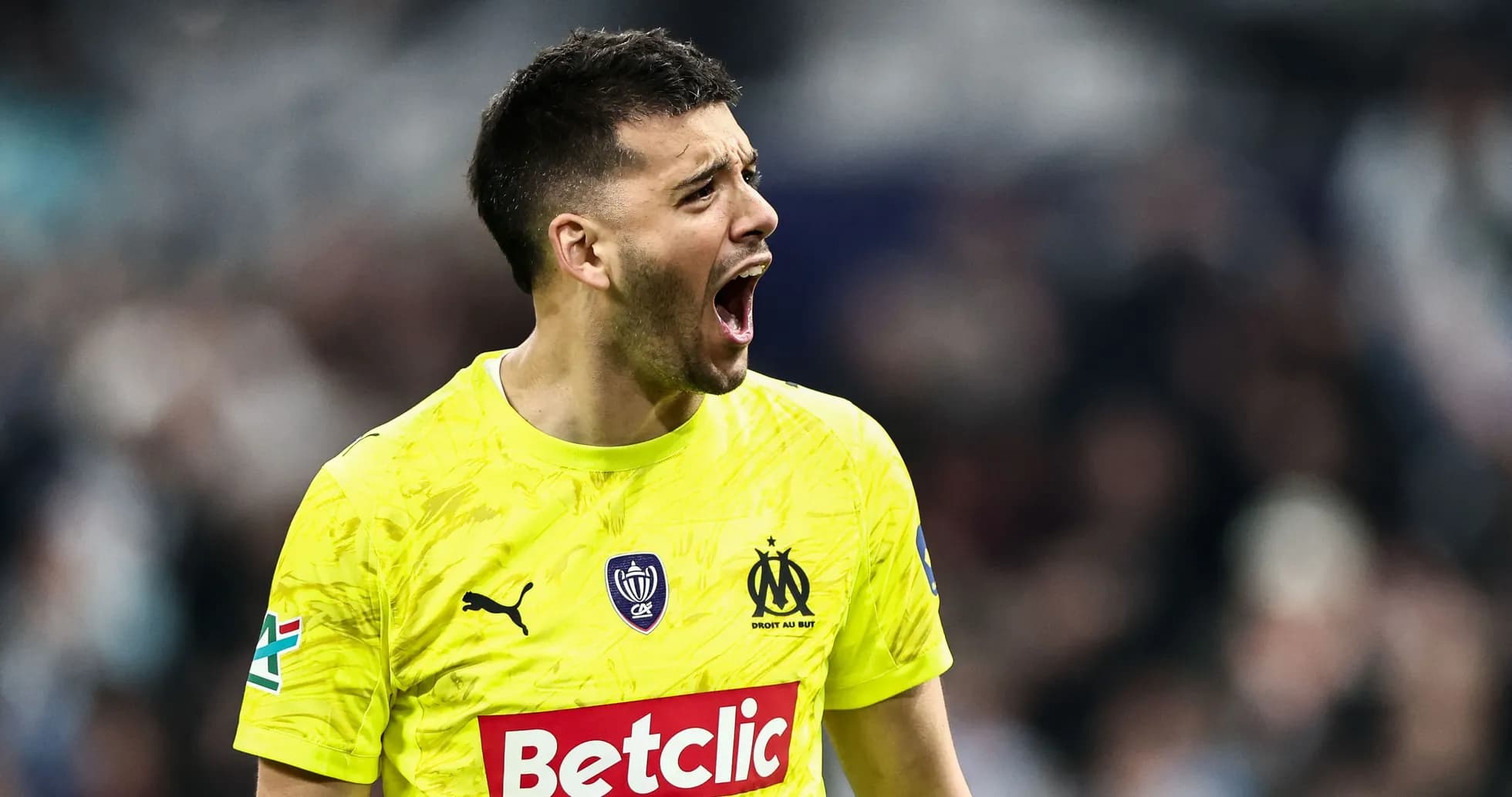 Goalkeeper celebrating during a football match Goalkeeper celebrating during a football match