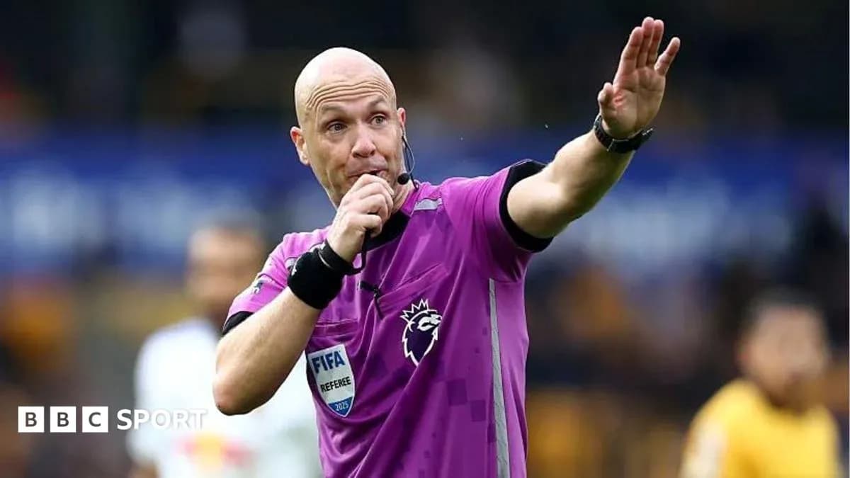 Referee signaling during a football match Referee signaling during a football match