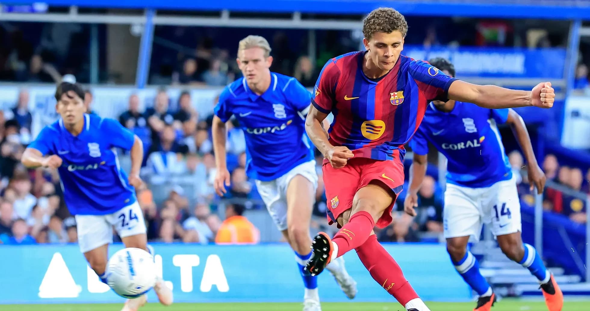 Barcelona player taking a penalty kick against Birmingham Barcelona player taking a penalty kick against Birmingham