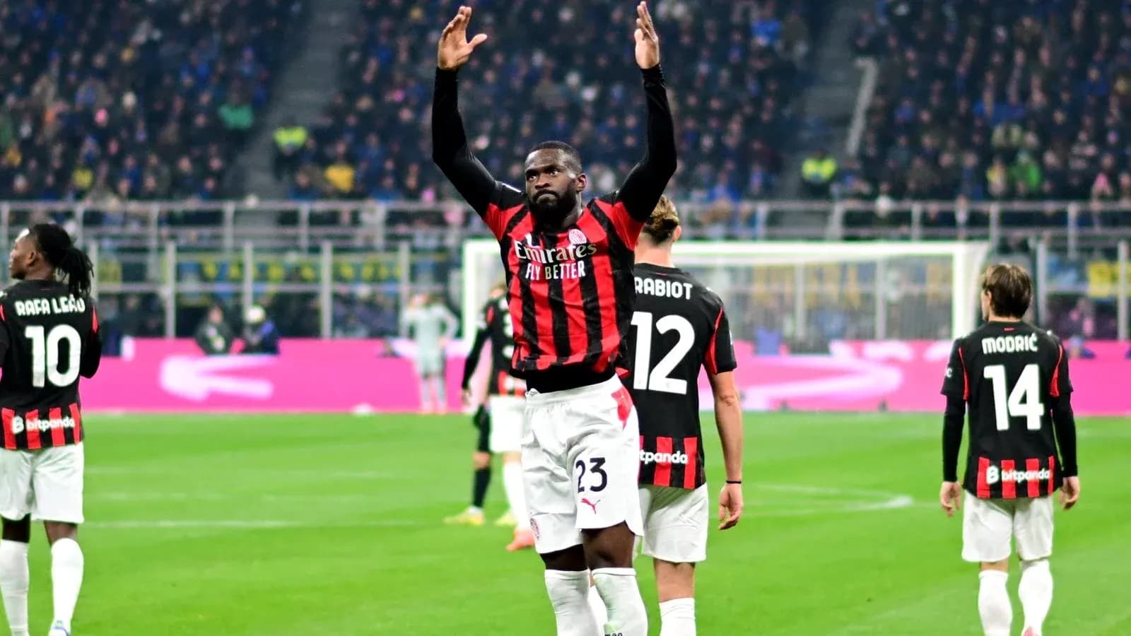 AC Milan players celebrating after a goal AC Milan players celebrating after a goal