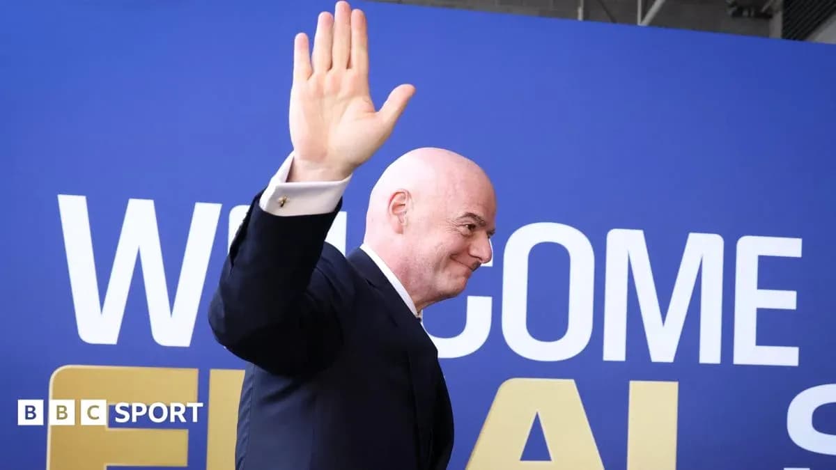 Official waving at event with welcome sign Official waving at event with welcome sign
