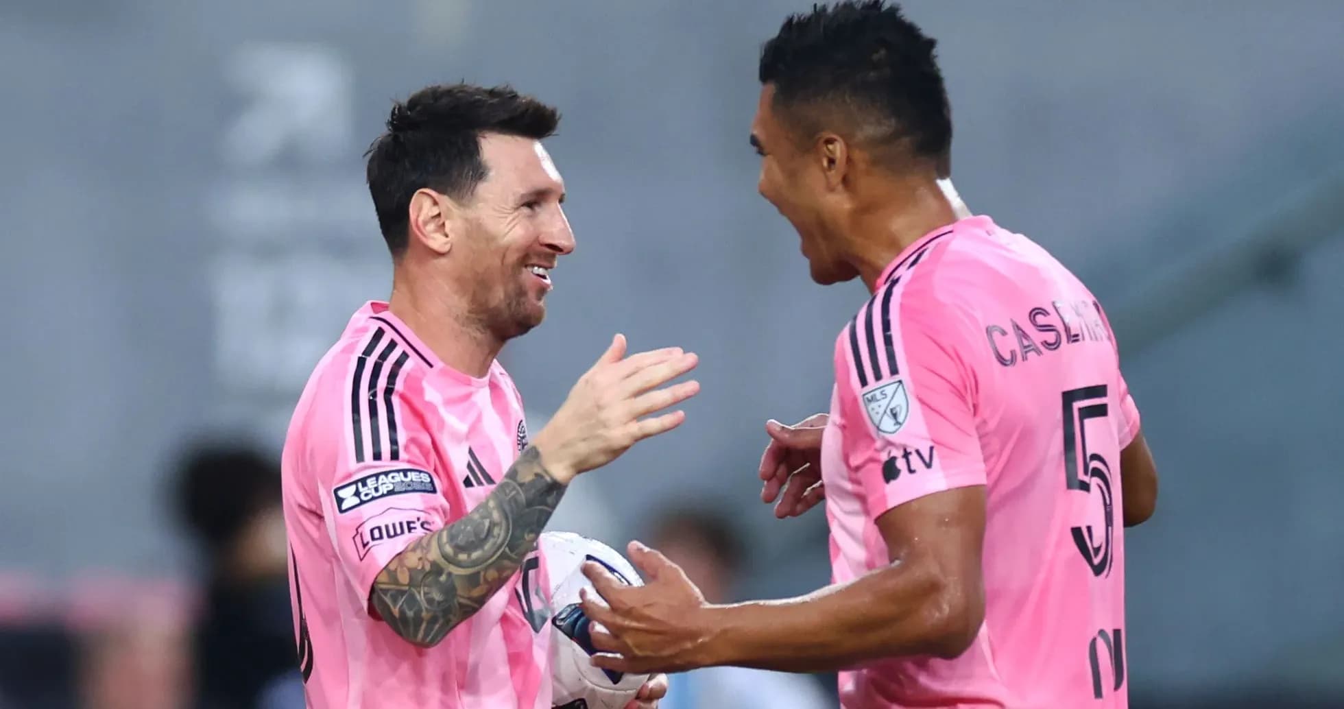 Messi and teammate celebrating during match Messi and teammate celebrating during match