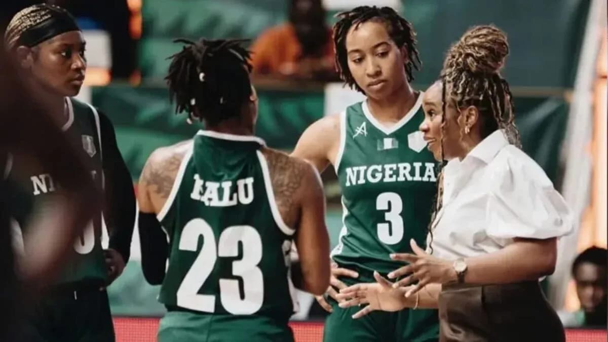 Nigerian basketball team discussing strategy during timeout Nigerian basketball team discussing strategy during timeout