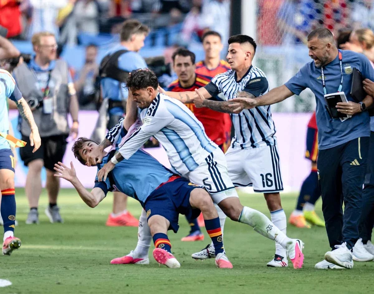 Players clashing during a heated moment in match Players clashing during a heated moment in match