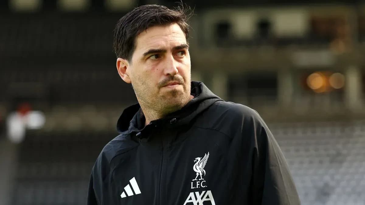 Liverpool coach observing during training session Liverpool coach observing during training session