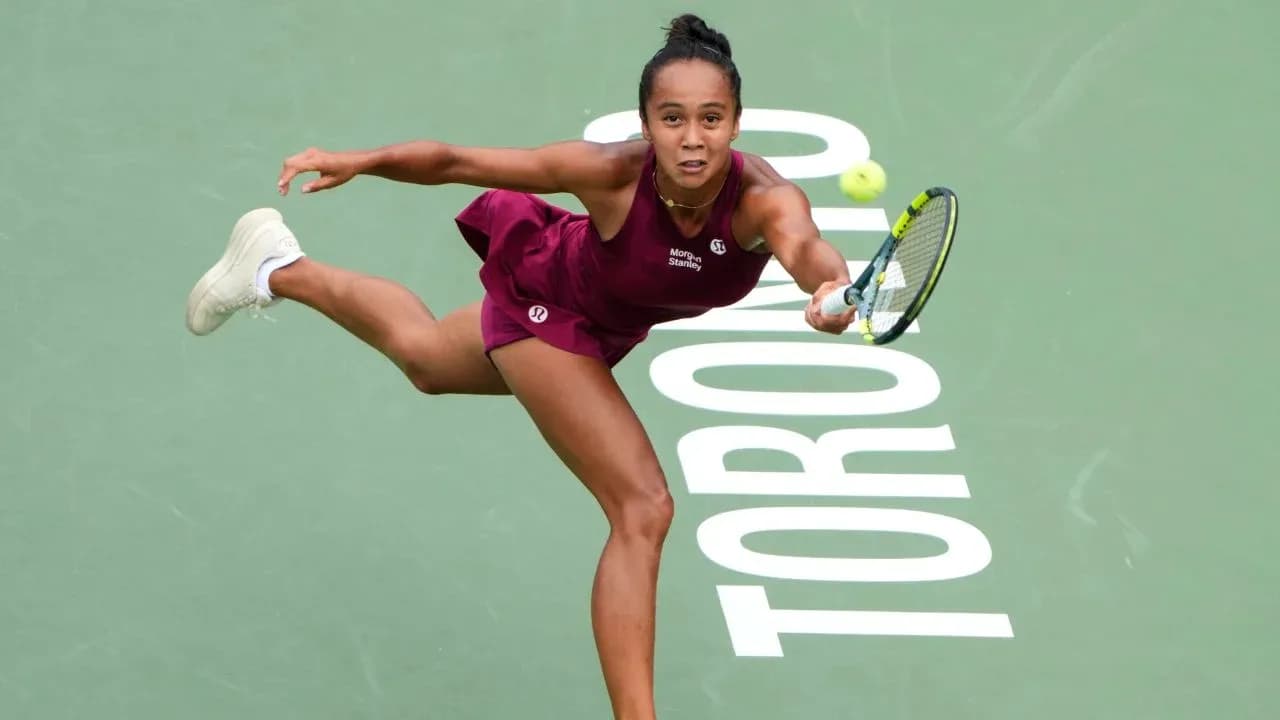 Tennis player hitting a ball during match Tennis player hitting a ball during match