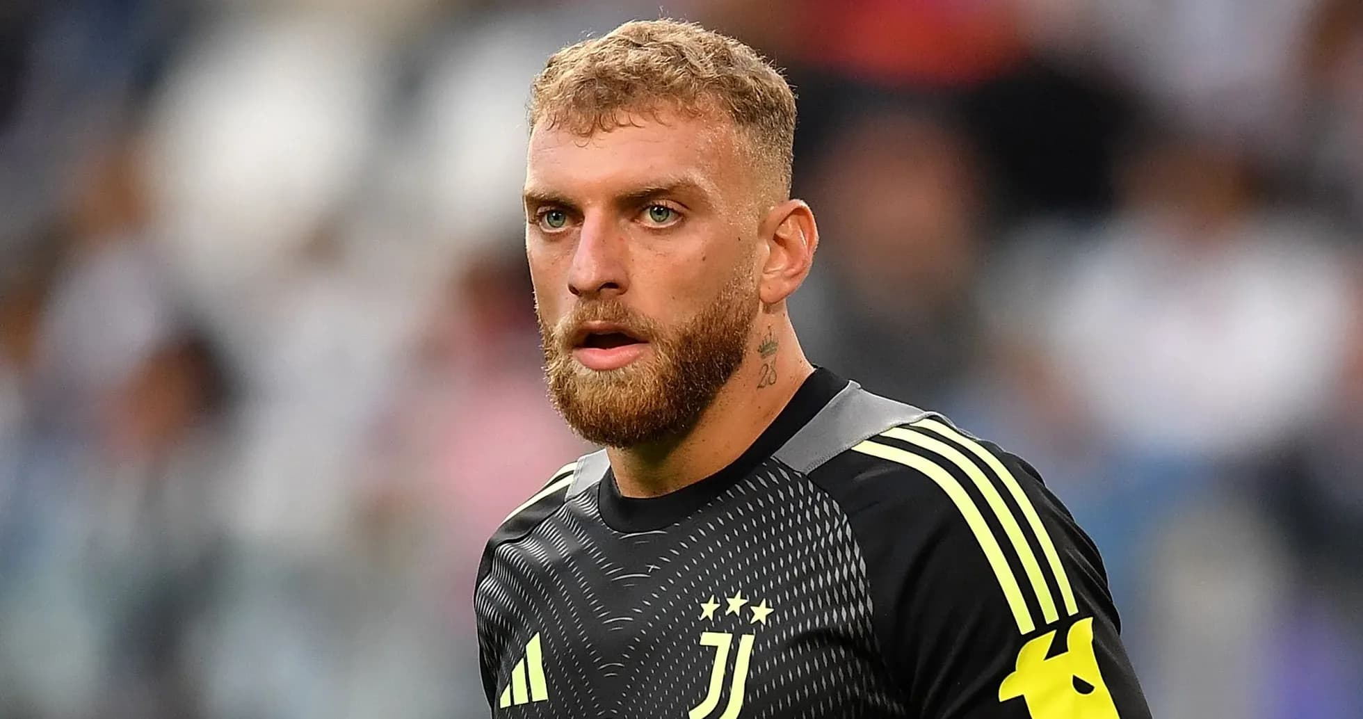 Goalkeeper wearing Juventus kit on the field Goalkeeper wearing Juventus kit on the field