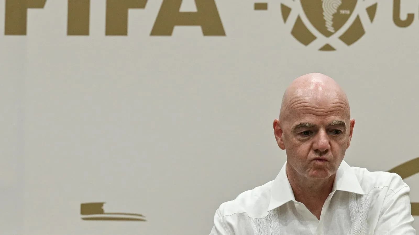 FIFA official speaking at press conference FIFA official speaking at press conference