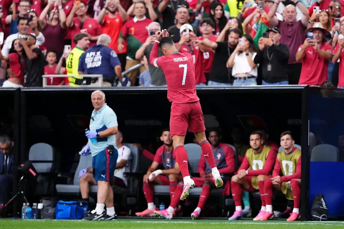 Cristiano Ronaldo celebrating with fans in stadium Cristiano Ronaldo celebrating with fans in stadium