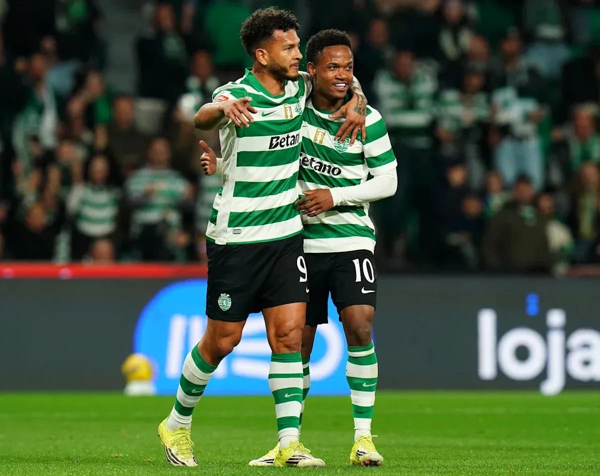 Sporting CP players celebrating on the field Sporting CP players celebrating on the field