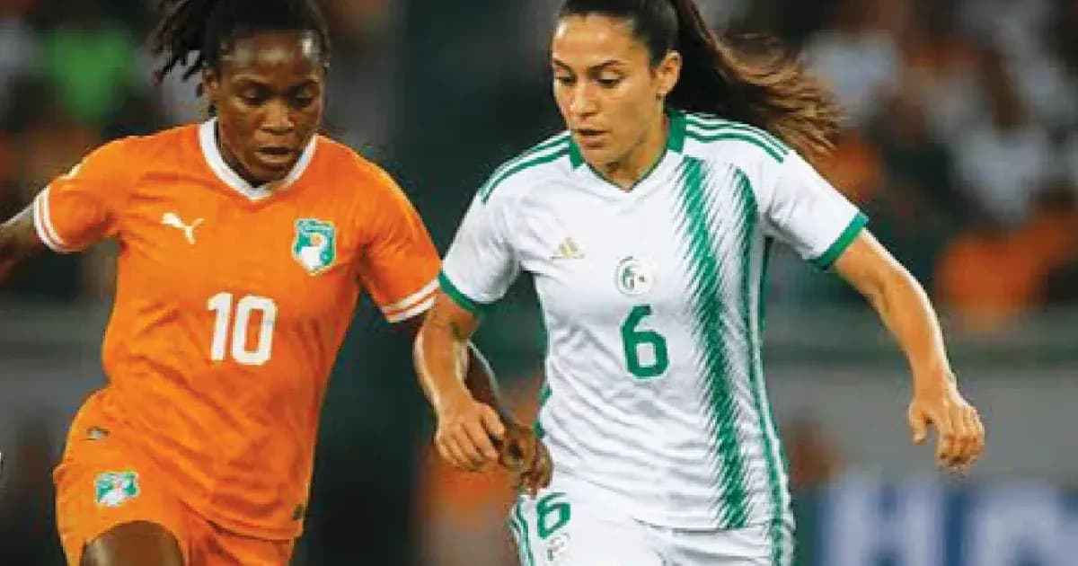 Two players competing for the ball in match Two players competing for the ball in match