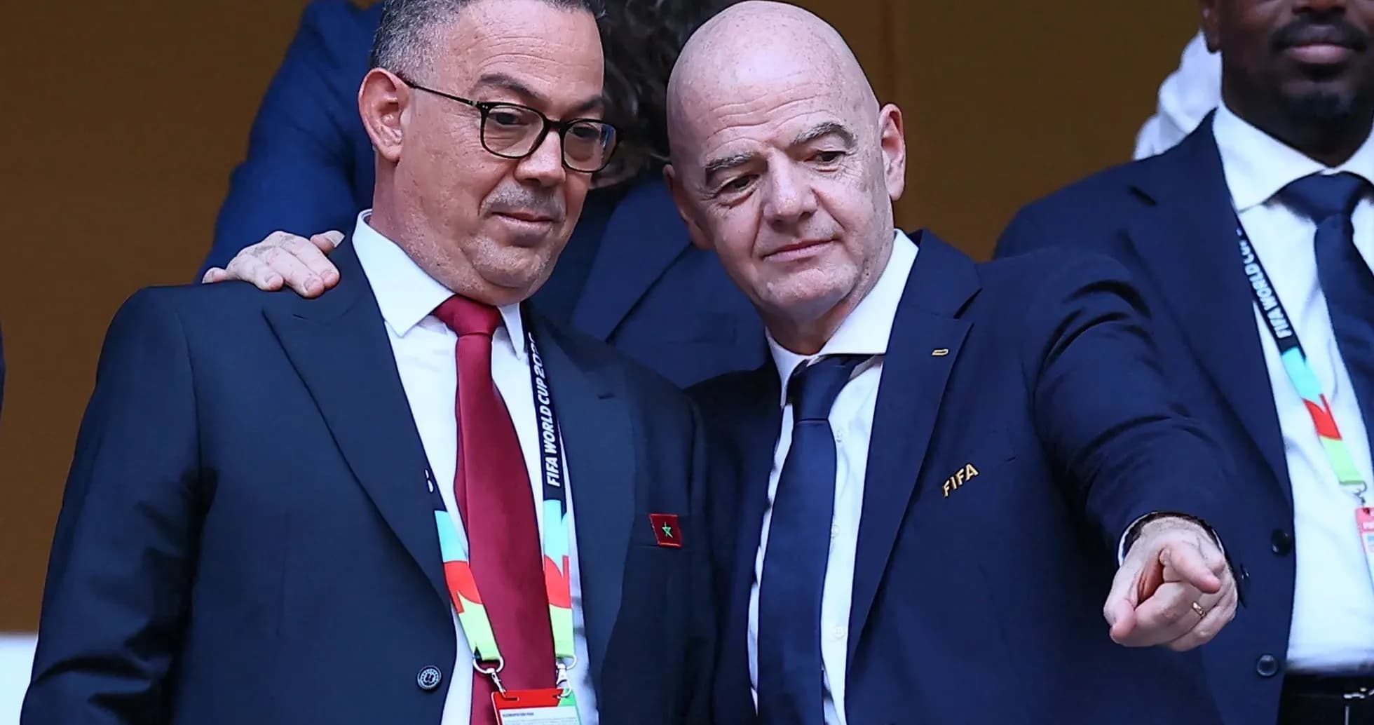 Two officials interacting during a football event Two officials interacting during a football event