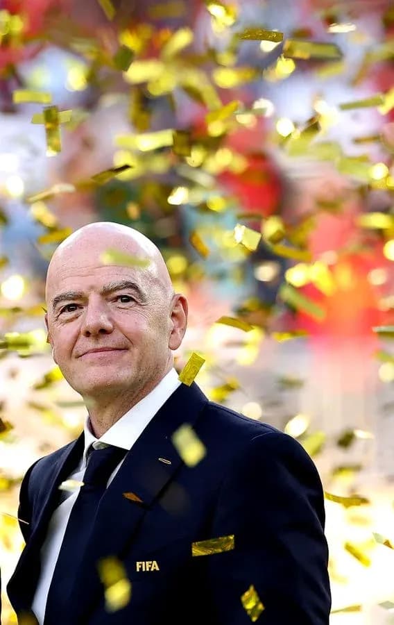 FIFA president surrounded by confetti at event FIFA president surrounded by confetti at event