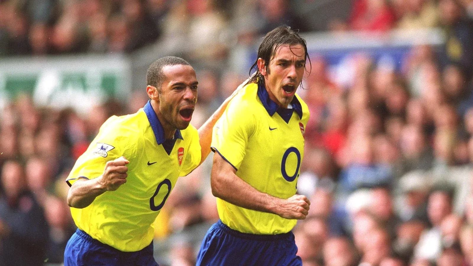 Arsenal players celebrating a goal during match Arsenal players celebrating a goal during match