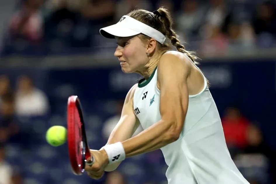 Tennis player hitting a forehand shot on court Tennis player hitting a forehand shot on court