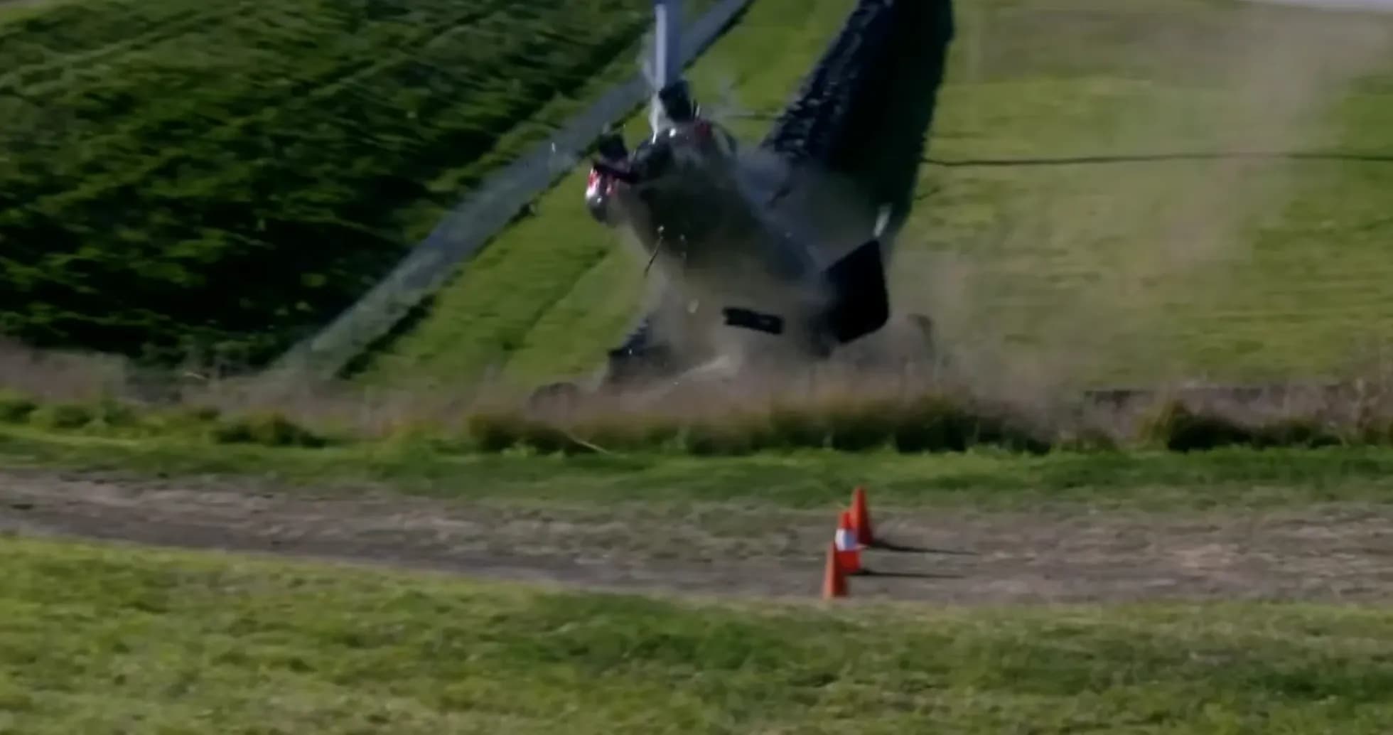Helicopter crashing on grassy terrain Helicopter crashing on grassy terrain