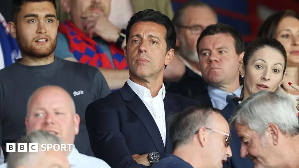 Spectators watching a match in stadium stands Spectators watching a match in stadium stands