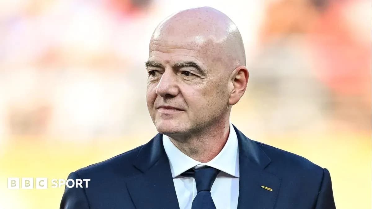 FIFA president walking at sports event venue FIFA president walking at sports event venue