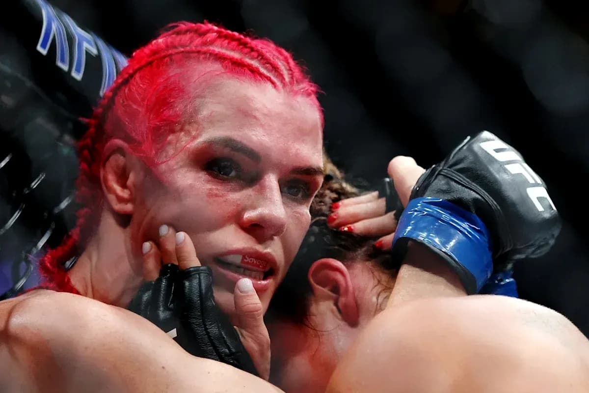 Fighter grappling with opponent during UFC match Fighter grappling with opponent during UFC match