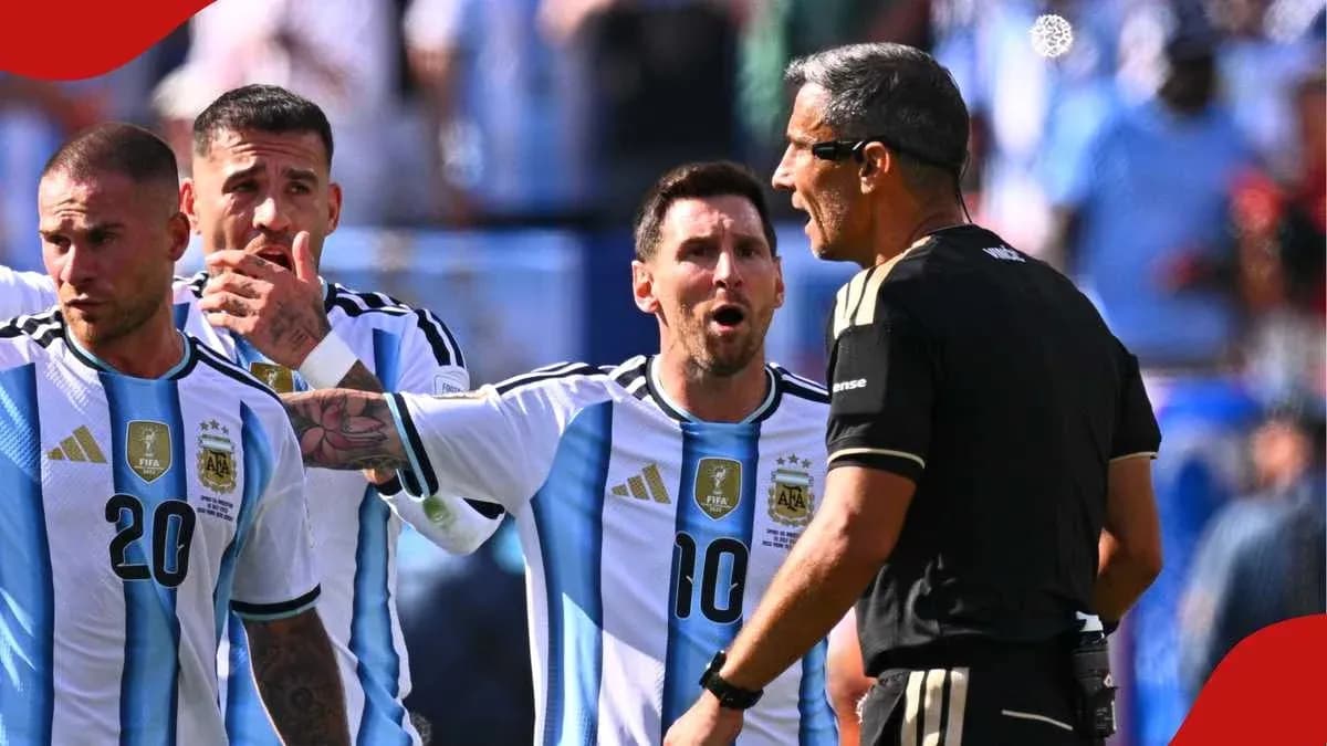 Lionel Messi arguing with referee during match Lionel Messi arguing with referee during match
