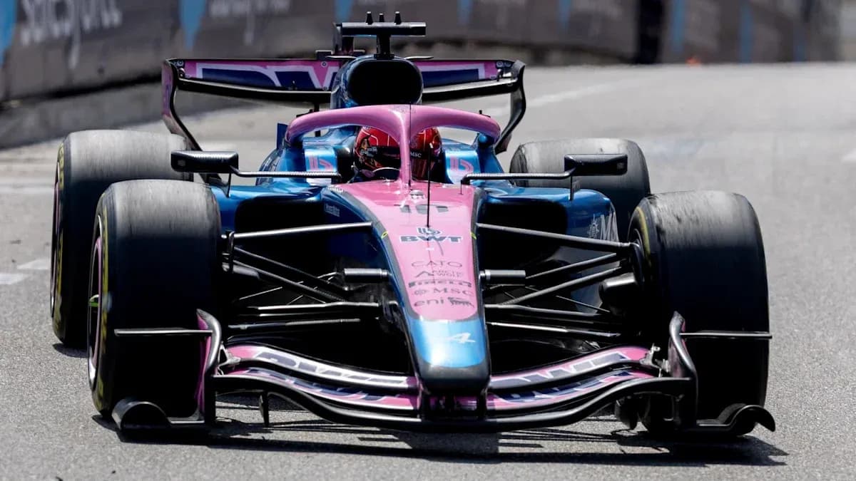 Formula 1 car racing on track during competition Formula 1 car racing on track during competition