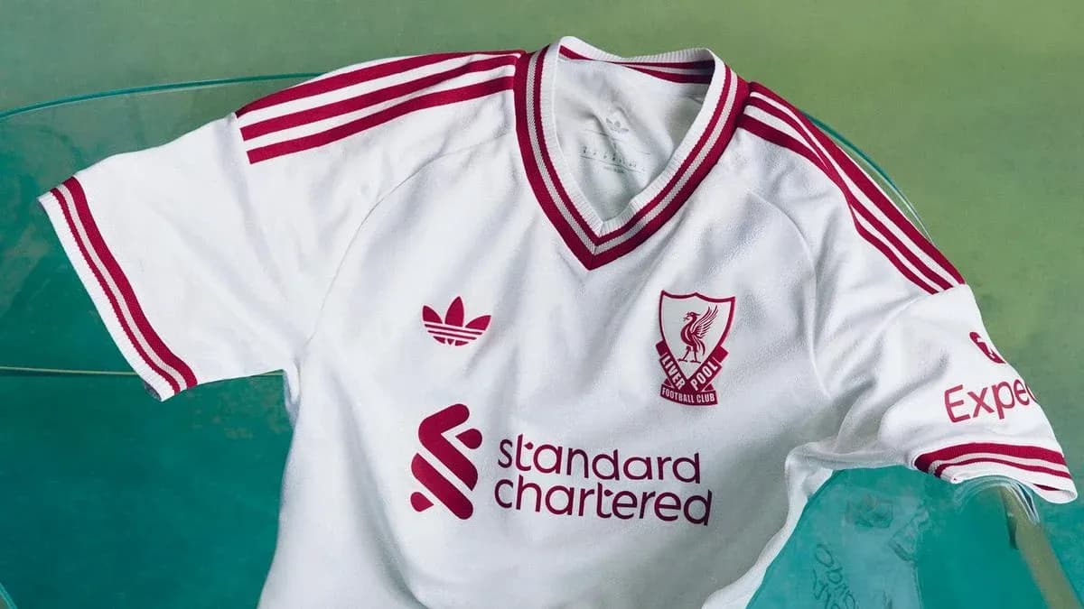 Liverpool FC white jersey with red accents Liverpool FC white jersey with red accents