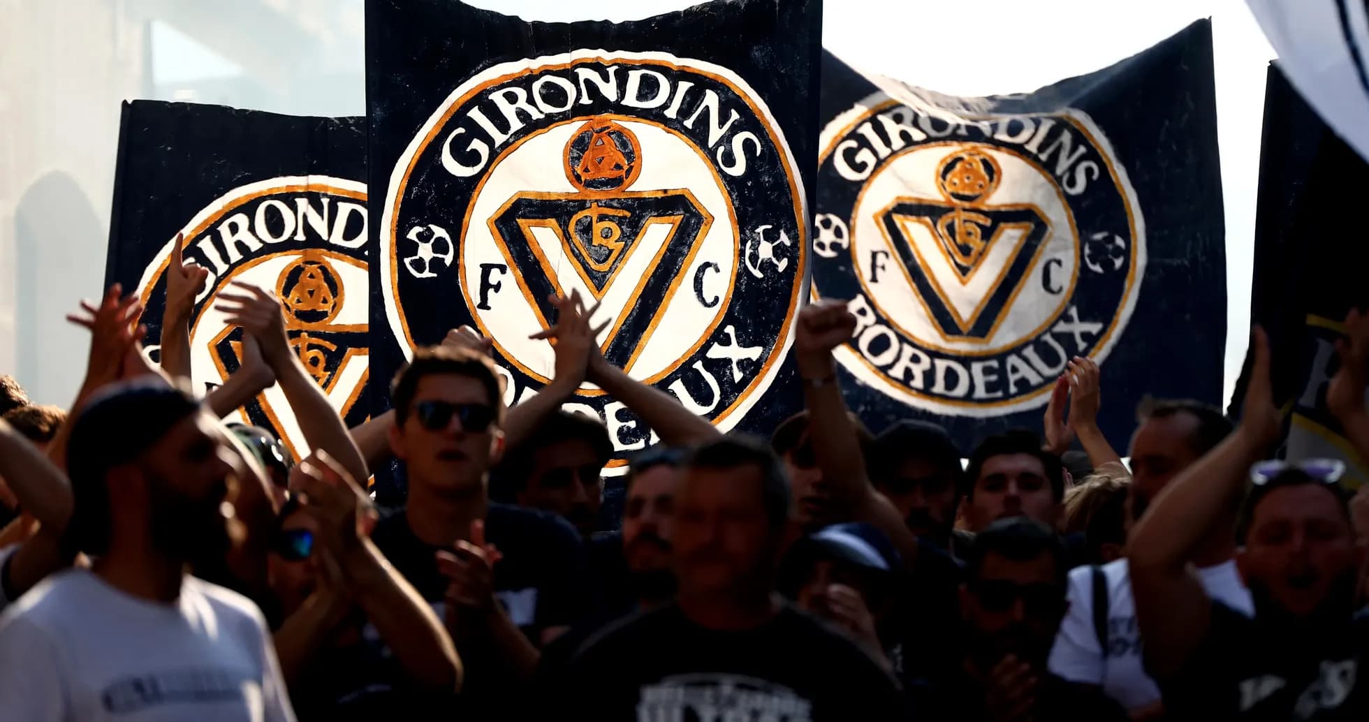 Girondins de Bordeaux fans with banners during event Girondins de Bordeaux fans with banners during event
