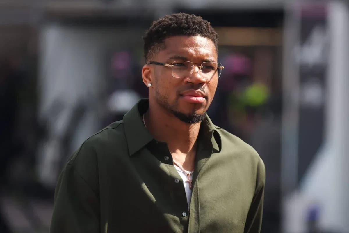 Basketball player walking in a stylish outfit Basketball player walking in a stylish outfit