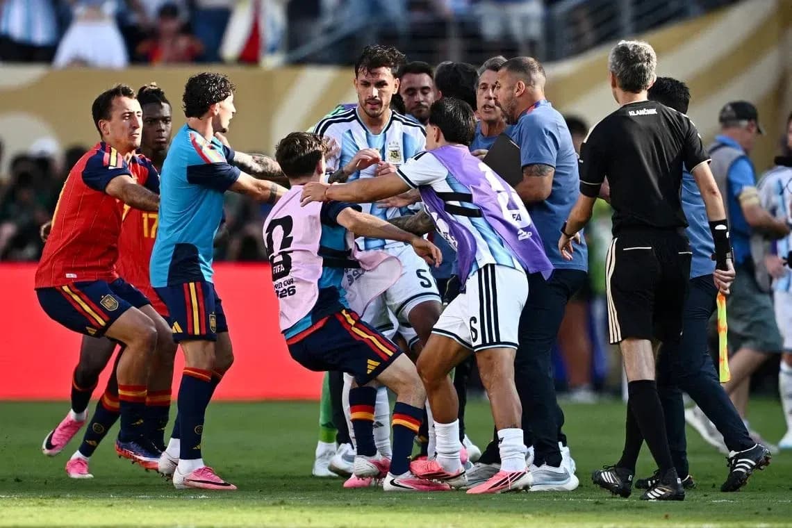 Players from Argentina and Spain in a scuffle Players from Argentina and Spain in a scuffle