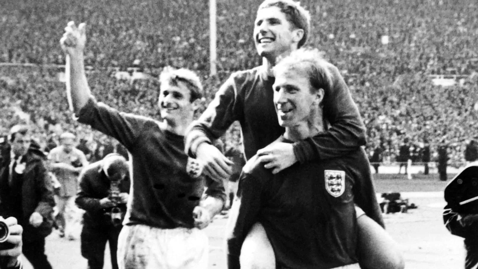 England players celebrating victory on the pitch England players celebrating victory on the pitch