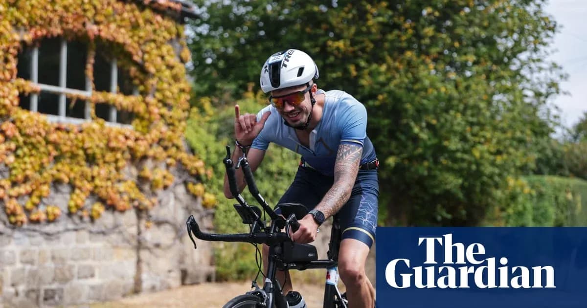 Biker signaling with hand while riding outdoors Biker signaling with hand while riding outdoors