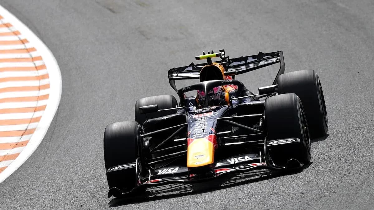 F1 car racing on track during a competition F1 car racing on track during a competition