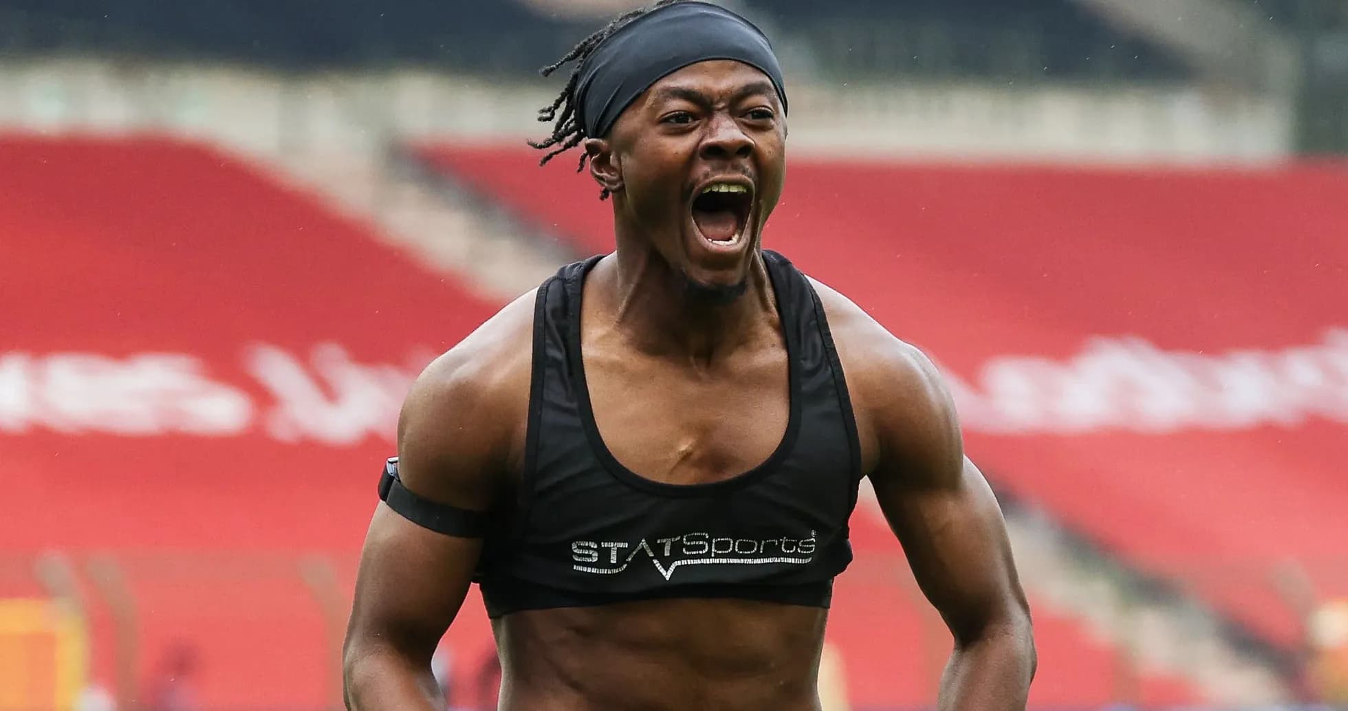 Athlete celebrating during training session on pitch Athlete celebrating during training session on pitch