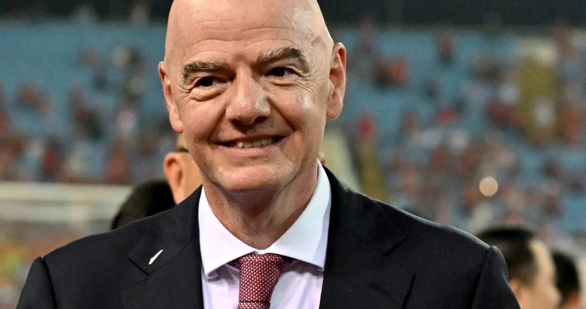 FIFA president smiling at football event FIFA president smiling at football event