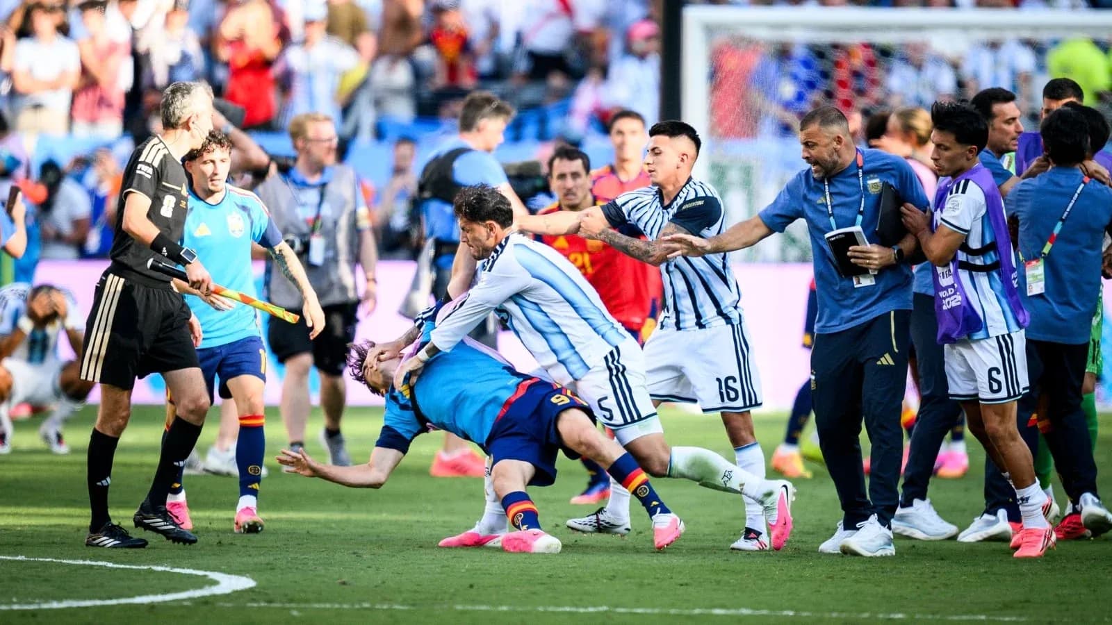 Players clashing during intense football match scene Players clashing during intense football match scene