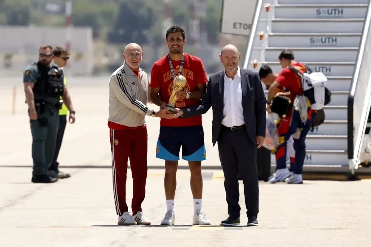 Football player receiving trophy at airport arrival Football player receiving trophy at airport arrival