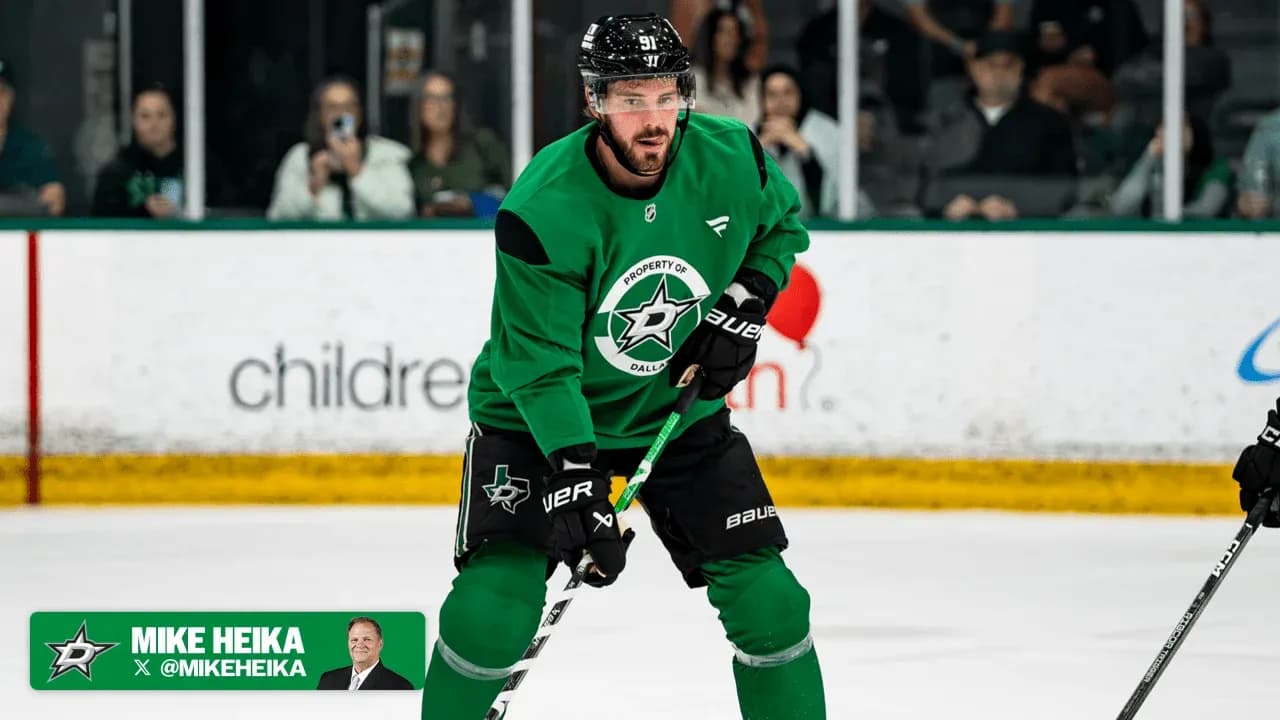 Hockey player practicing on ice rink in green jersey Hockey player practicing on ice rink in green jersey