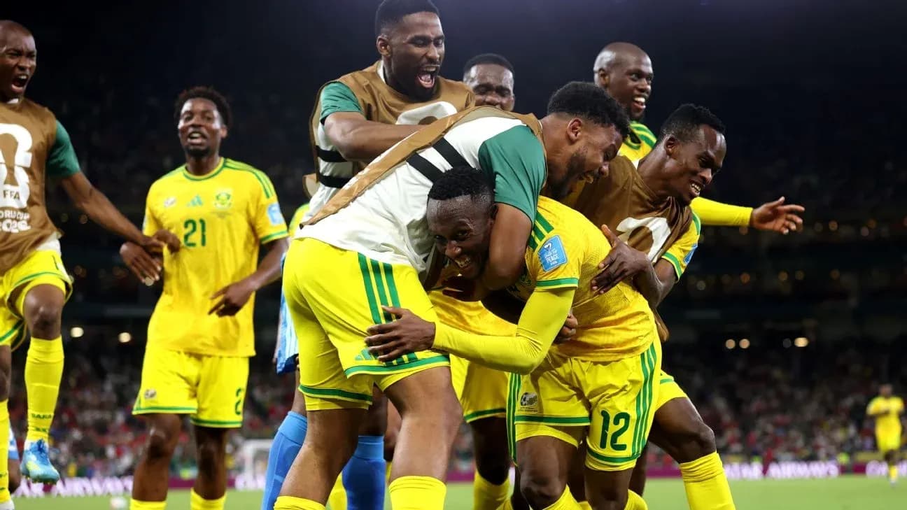 South African players celebrating a goal together South African players celebrating a goal together