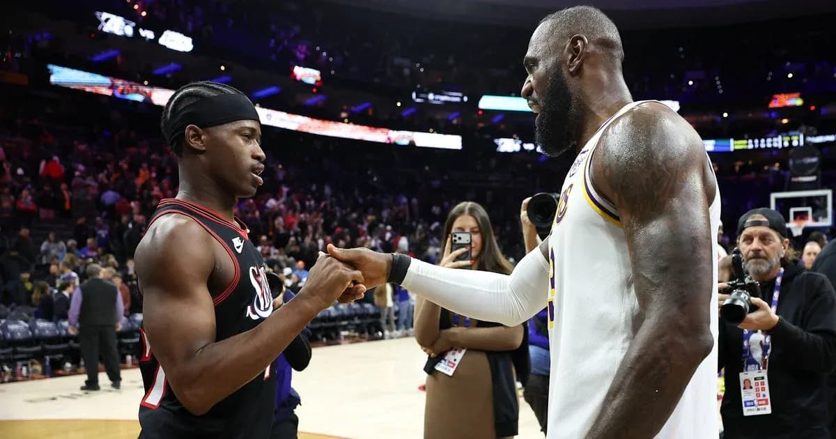 Two basketball players shaking hands post-game Two basketball players shaking hands post-game