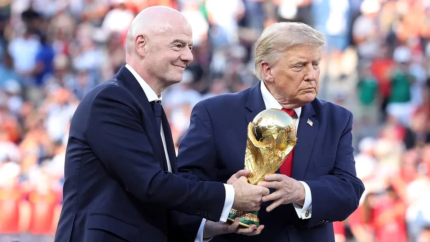 Gianni Infantino and Donald Trump with World Cup trophy Gianni Infantino and Donald Trump with World Cup trophy