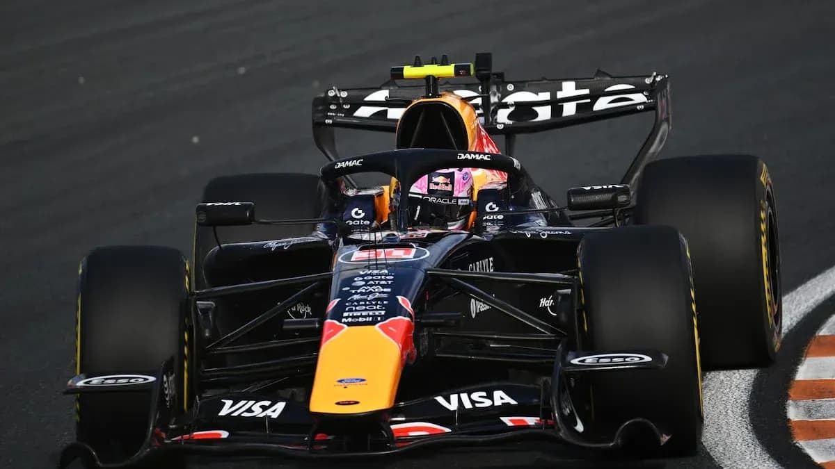 Formula 1 car racing on track during competition Formula 1 car racing on track during competition