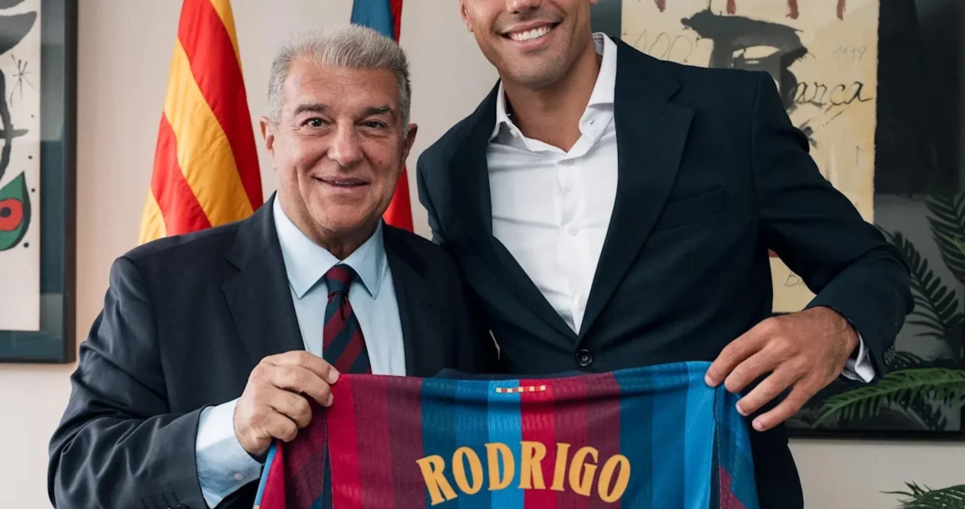 Rodrigo holding Barcelona jersey with president Rodrigo holding Barcelona jersey with president